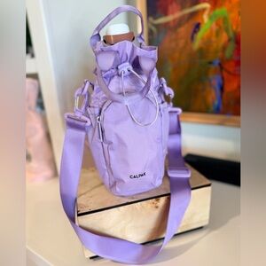 Calpak Insulated Collection Crossbody Drawstring Water Bottle Holder in Orchid